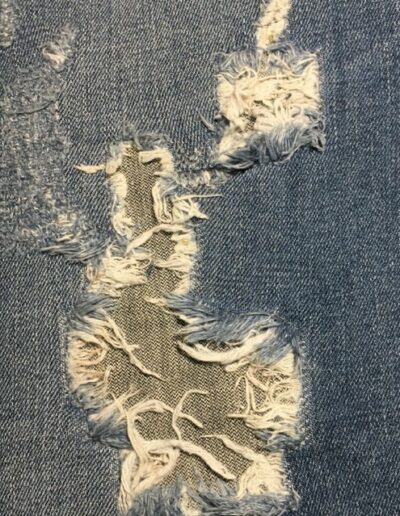 Retouche-Apres-la-pose-de-patch-(tissu)-sur-un-trou