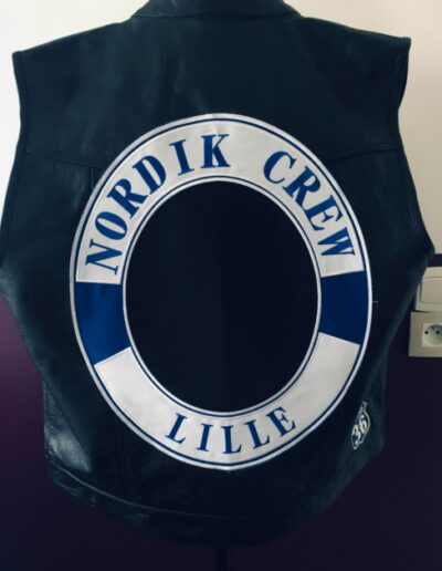 Pose-d'ecusson-dans-le-dos